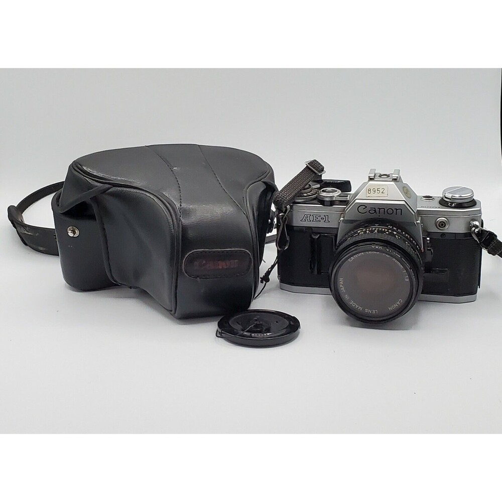 Canon AE-1 Program 35mm SLR Film Camera Bundle with 50mm, 135mm & 70-150mm Lense